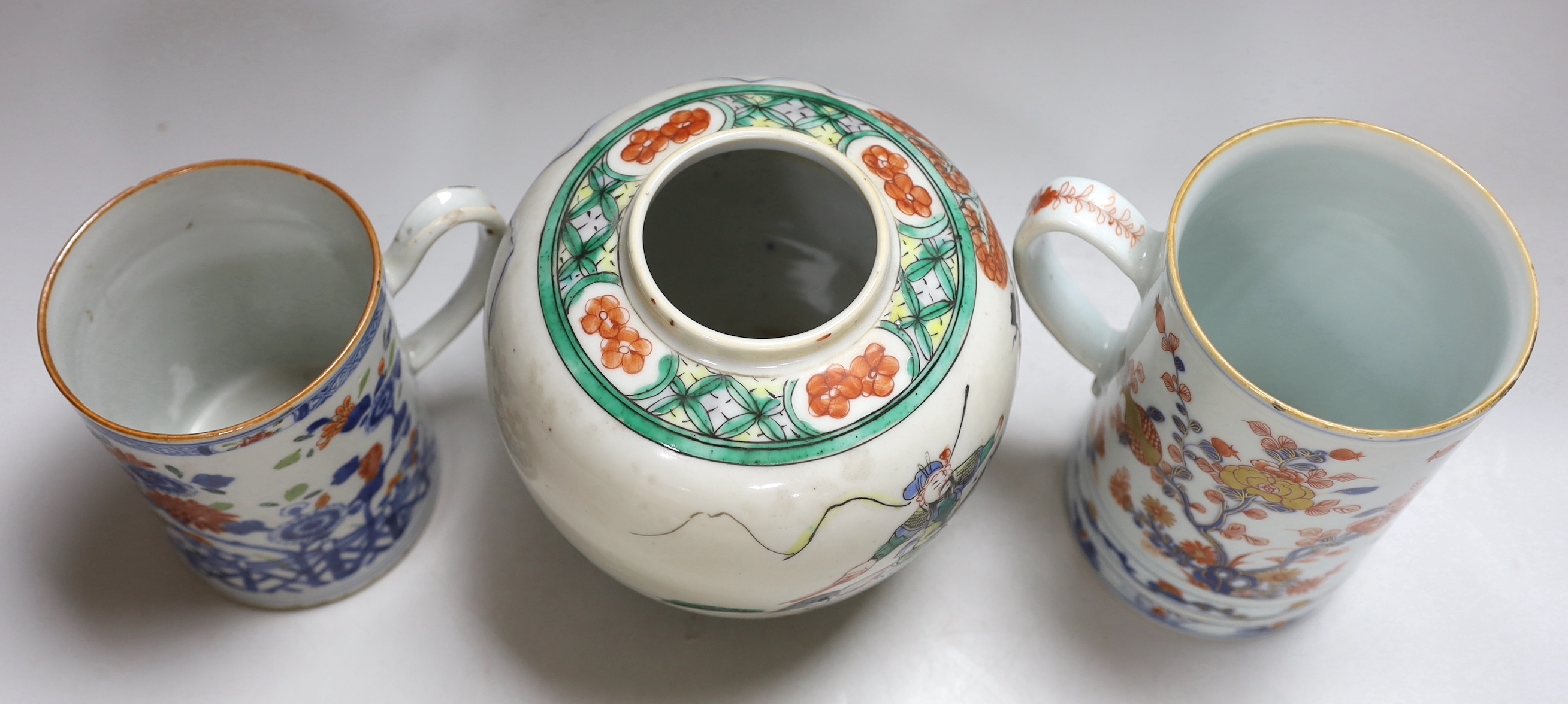 A Chinese Imari large mug, early 18th century, a Chinese famille rose mug, Qianlong period and a famille verte jar, tallest 17cm high